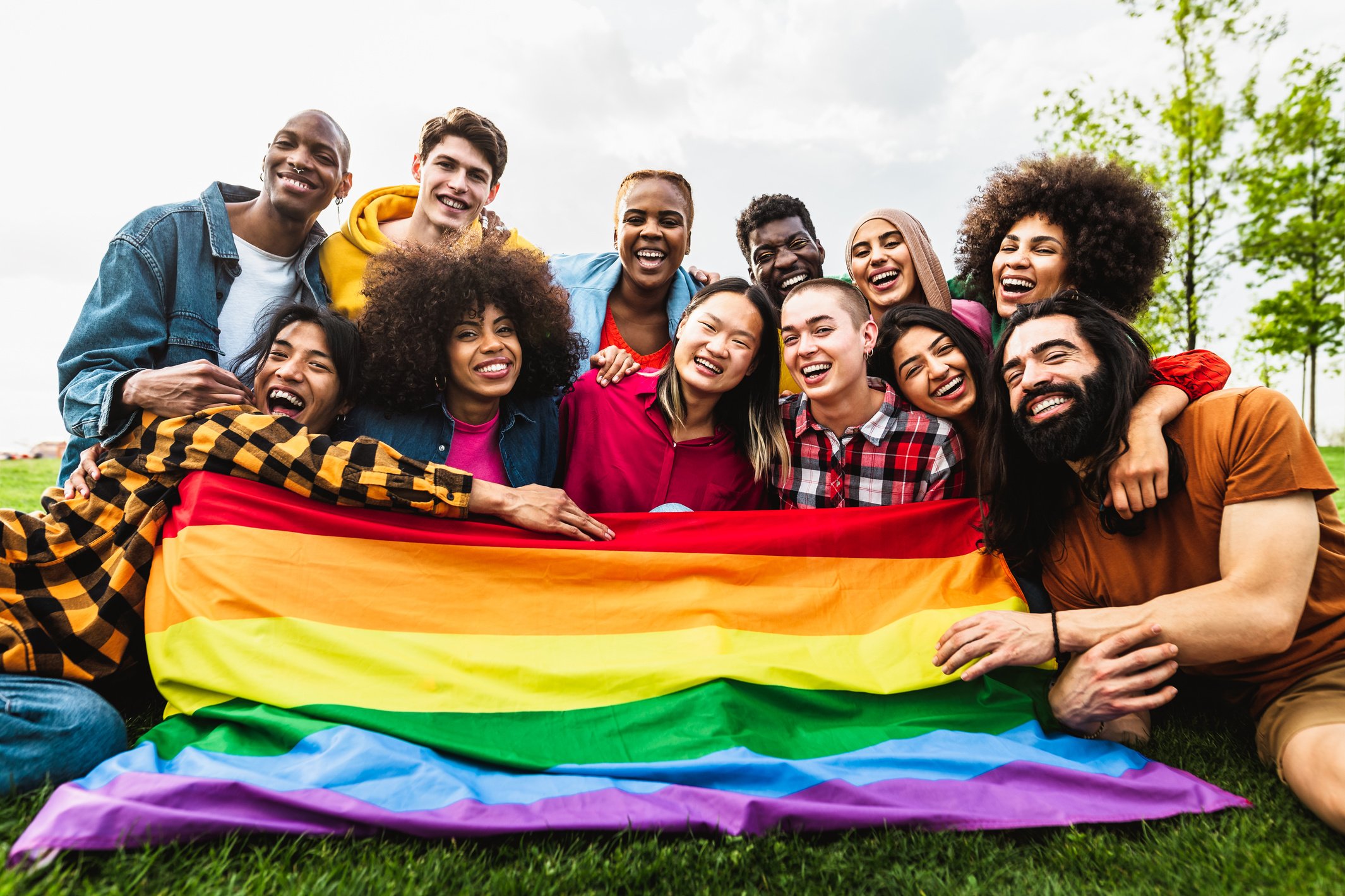 Diverse People with an LGBT Pride Flag 